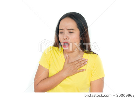 The woman wore a yellow shirt with a cough and put The woman wore a yellow shirt with a cough and put 50009962