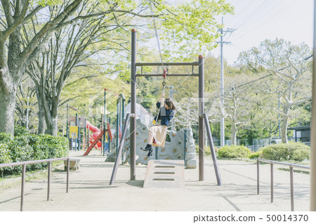 Women playing in the park Women playing in the park 50014370