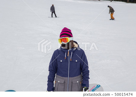 A woman who stands on the slope A woman who stands on the slope 50015474