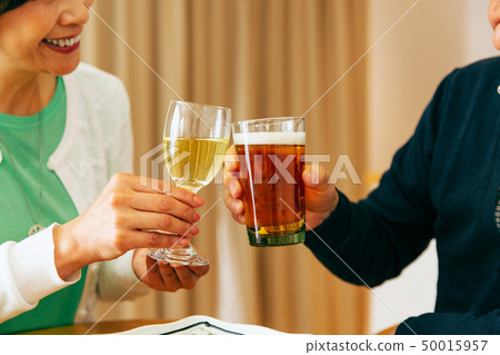 Couple supper liquor alcohol toast Couple supper liquor alcohol toast 50015957