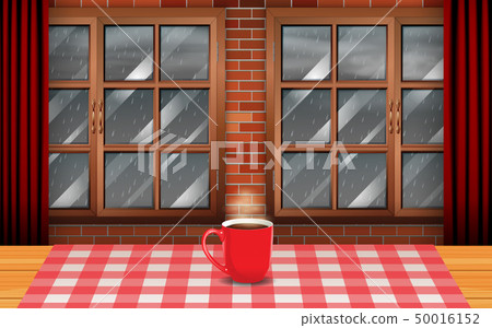 hot coffee on the wooden table at windows in the r 50016152