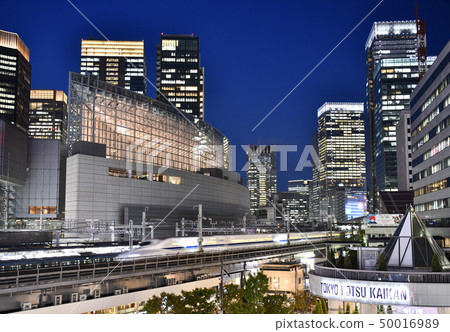 Tokyo cityscape in Japan Shinkansen running through Yurakucho Station 50016989