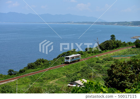 Sanin line Kiha 120 series one man car running along the Japan Sea in Shimane Prefecture Sanin line Kiha 120 series one man car running along the Japan Sea in Shimane Prefecture 50017115