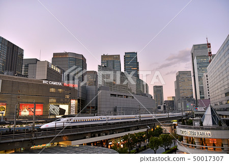 Tokyo cityscape in Japan Thank you very much .... Shinkansen running through Yurakucho Station (right back to Tokyo Station) Tokyo cityscape in Japan Thank you very much .... Shinkansen running through Yurakucho Station (right back to Tokyo Station) 50017307