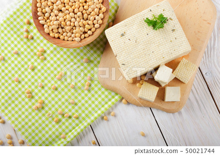 Flat lay view at Soy Bean curd tofu on cutting 50021744