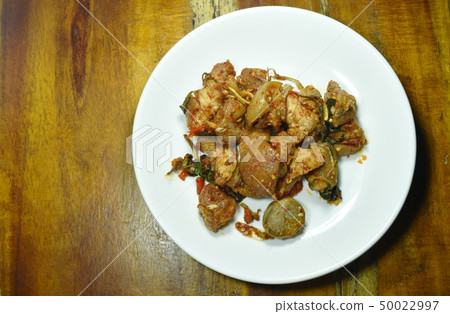 spicy stir fried pork leg with eggplant curry 50022997