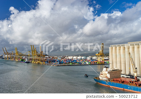 Panoramic view of the port in Barcelona with containers and cranes Panoramic view of the port in Barcelona with containers and cranes 50023712