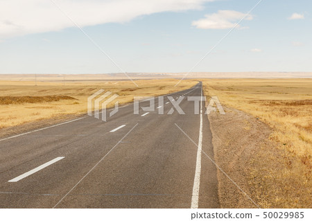 asphalt road Sainshand Zamiin-Uud in Mongolia 50029985