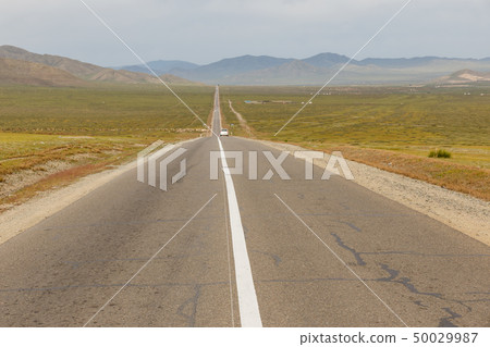 Asphalt road Sukhe Bator - Darkhan in Mongolia Asphalt road Sukhe Bator - Darkhan in Mongolia 50029987