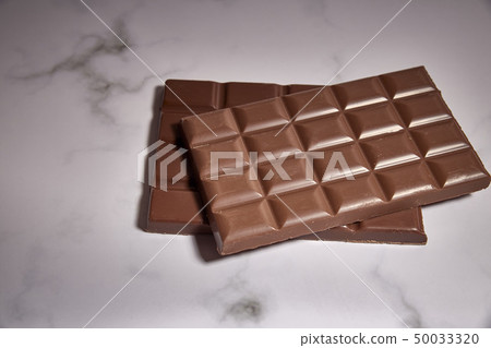stack of tasty chocolate bars 50033320