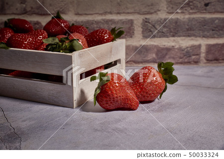 set of tasty red strawberries 50033324