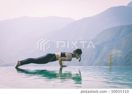 woman practice yoga Plank or Phalakasana Pose woman practice yoga Plank or Phalakasana Pose 50035310