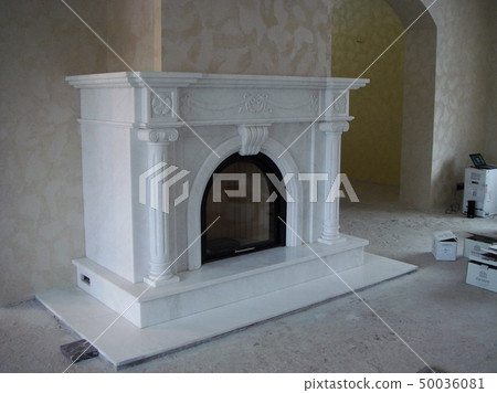 Stylish fireplace with fire in home interior Stylish fireplace with fire in home interior 50036081