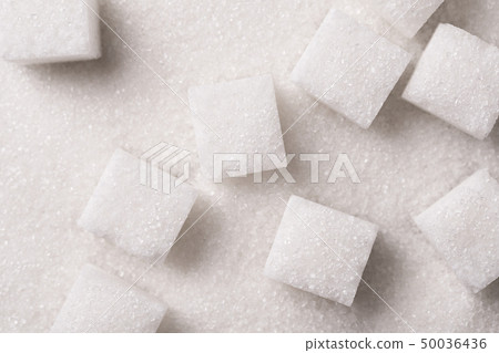 White sugar cubes close up. White sugar cubes close up. 50036436