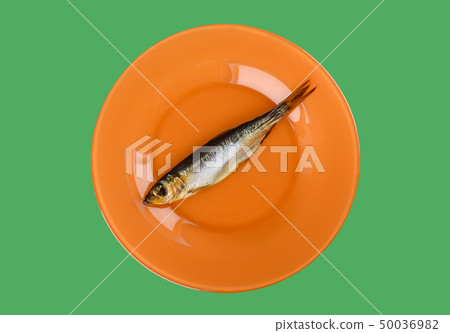 Cold smoked Baltic herring on an orange plate Cold smoked Baltic herring on an orange plate 50036982