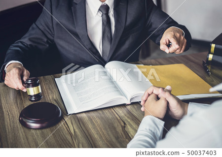 Businessman and Male lawyer or judge consult Businessman and Male lawyer or judge consult 50037403