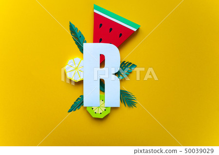 letter r cut from paper with tropical fruit paper 50039029