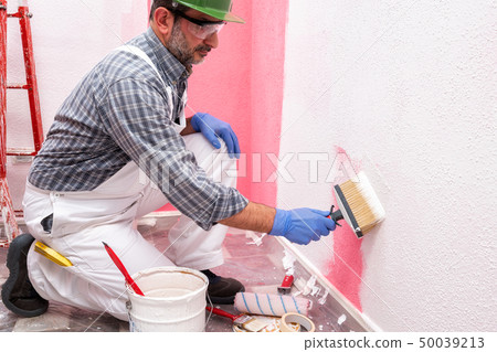 House painter worker at work in the construction 50039213