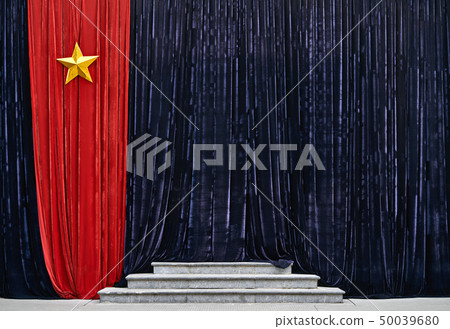 Massive curtains with Vietnam flag with shiny metal star outdoors 50039680