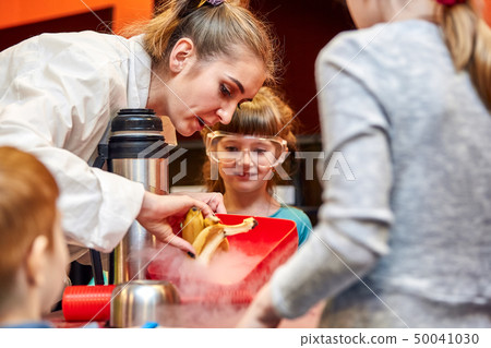 Chemical show for kids. Professor carried out chemical experiments with liquid nitrogen on Birthday 50041030