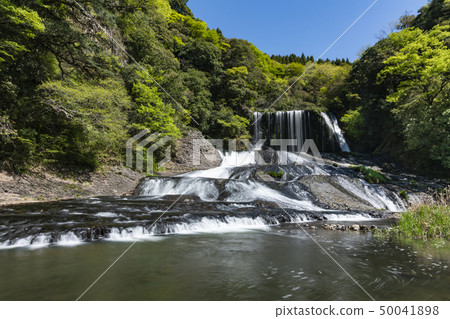 Fresh green dragon gate waterfall 50041898