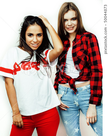 best friends teenage girls together having fun, posing emotional on white background, besties happy best friends teenage girls together having fun, posing emotional on white background, besties happy 50044873