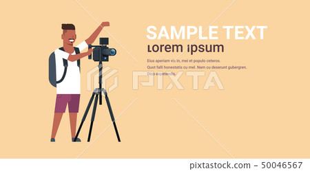 professional videographer using camera on tripod african american man shooting video on steady cam 50046567