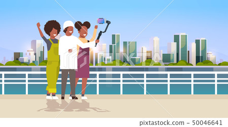 casual people using 3-axis gimbal stabilizer selfie stick for smartphone happy african american casual people using 3-axis gimbal stabilizer selfie stick for smartphone happy african american 50046641