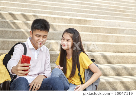 Selfie-portrait of funny couple outdoor Selfie-portrait of funny couple outdoor 50047119