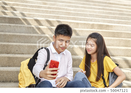 Selfie-portrait of funny couple outdoor Selfie-portrait of funny couple outdoor 50047121