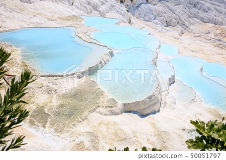 Travertines with turquoise water in Pamukkale. Travertines with turquoise water in Pamukkale. 50051797