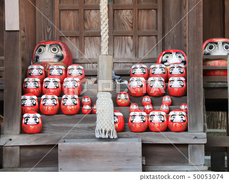 Traditional japanese daruma dolls in a shrine, 50053074