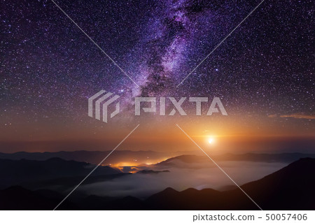 Mountain scene with twilight sky, Moon and shining stars of Milky Way Mountain scene with twilight sky, Moon and shining stars of Milky Way 50057406