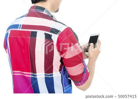 Rear view of man touch the mobile phone screen 50057415