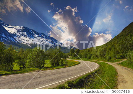 Empty asphalt road with cloudy sky and sunlight Empty asphalt road with cloudy sky and sunlight 50057416