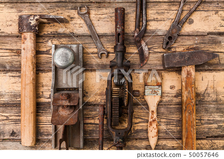 Old vintage hand tools on wooden background 50057646