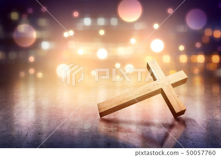 Christian cross on the concrete floor Christian cross on the concrete floor 50057760