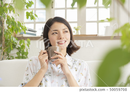 Young Woman Lifestyle Relax Relax Tea Time Young Woman Lifestyle Relax Relax Tea Time 50059708