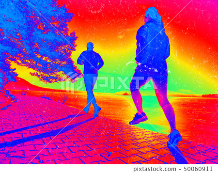 Runner athlete running on road at lake. Man 50060911