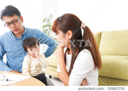 Young couple holding a family meeting Young couple holding a family meeting 50061791