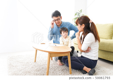 Young couple holding a family meeting Young couple holding a family meeting 50061793