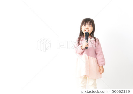 Kid using a microphone Kid using a microphone 50062329