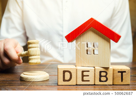 Wooden blocks with the word Debt  50062687