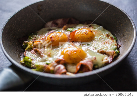 English breakfast fried bacon ham and eggs in English breakfast fried bacon ham and eggs in 50065143