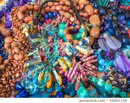 Colorful gemstone necklace background. Semi-Precious Stones Beads Colorful gemstone necklace background. Semi-Precious Stones Beads 50065188