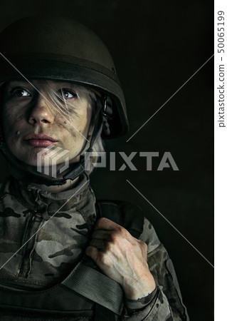 Portrait of young female soldier Portrait of young female soldier 50065199
