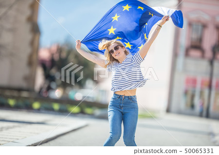 Attractive happy young girl with the flag of the 50065331