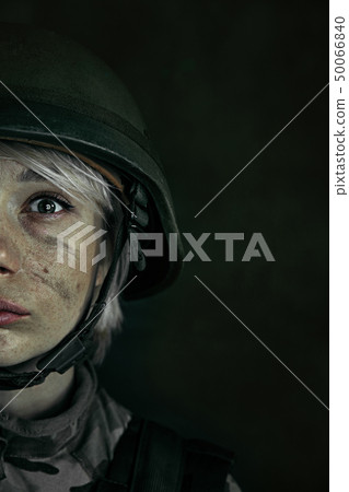 Portrait of young female soldier 50066840