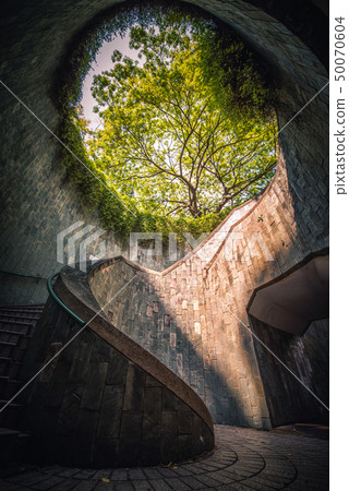 Spiral staircase at sunset in Fort Canning Park, 50070604