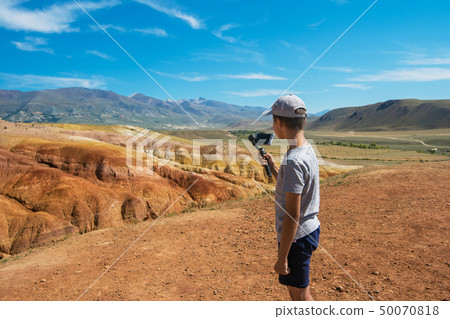 Young boy in valley of Mars 50070818